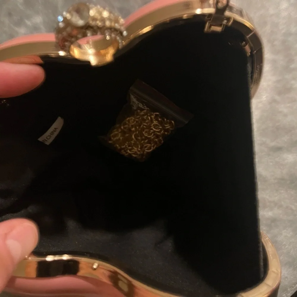 Heart-Shaped Pink Clutch with Gold Handle